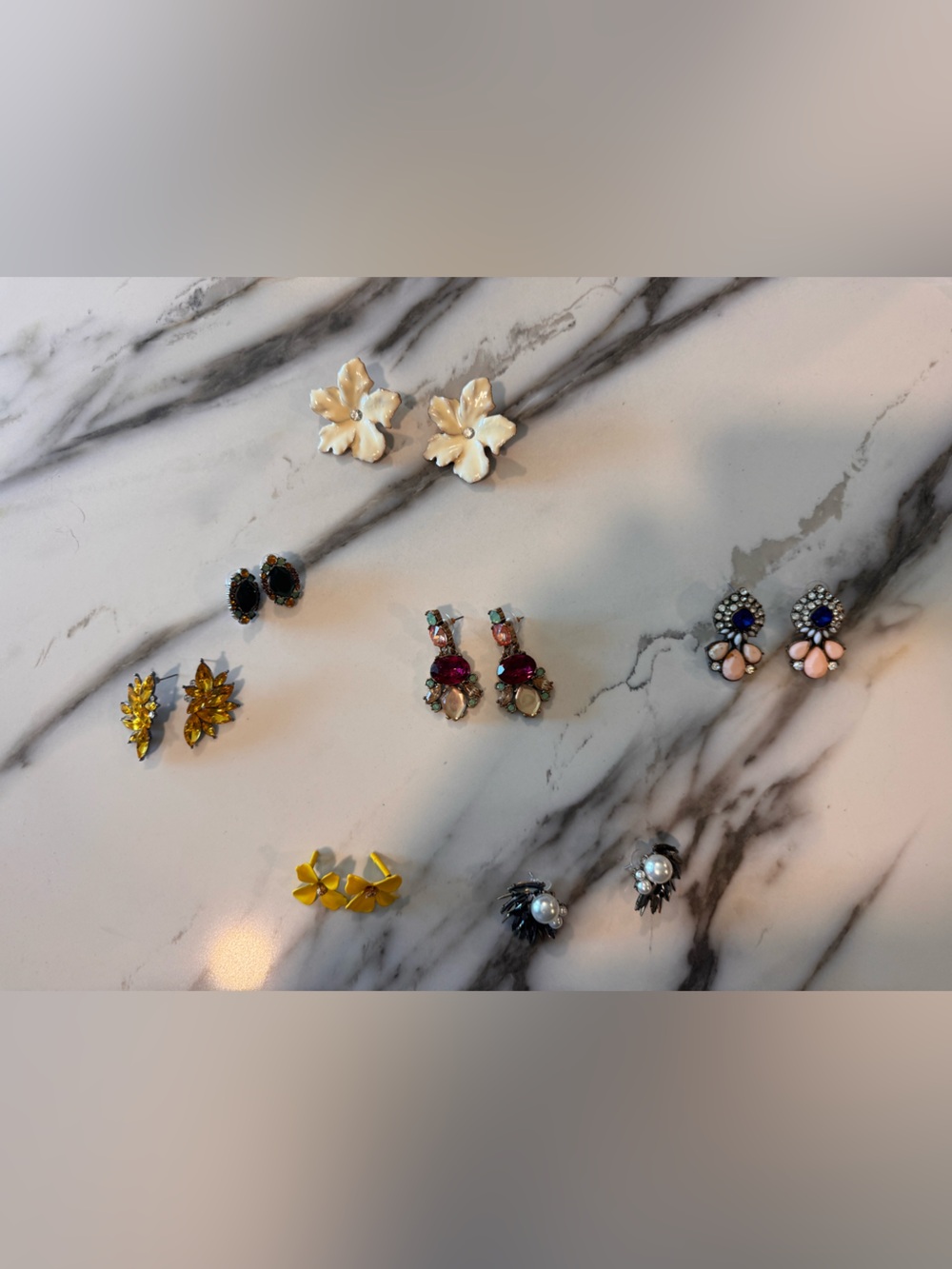 7 pairs of costume earrings